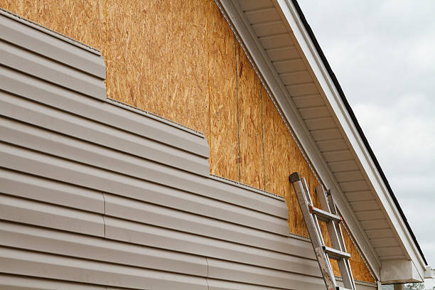Professional Siding Replacement technician working in Cedar Mountain, NC